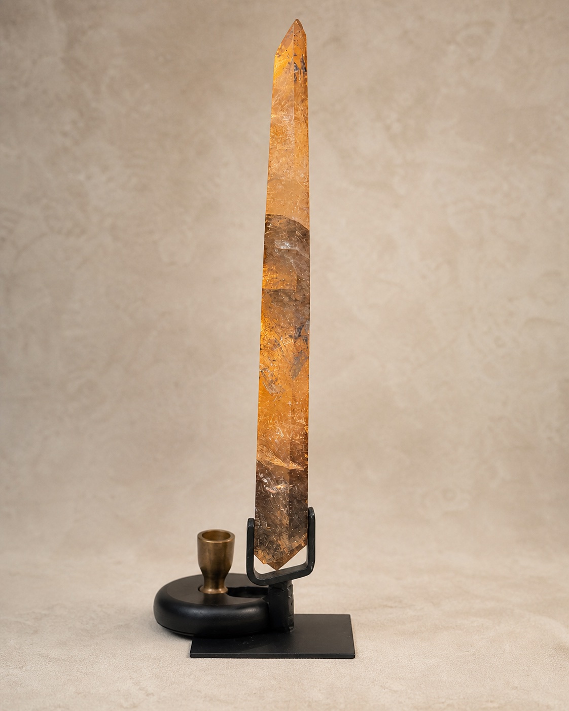 Narrow side profile showing the depth of the quartz shield-point sculpture
