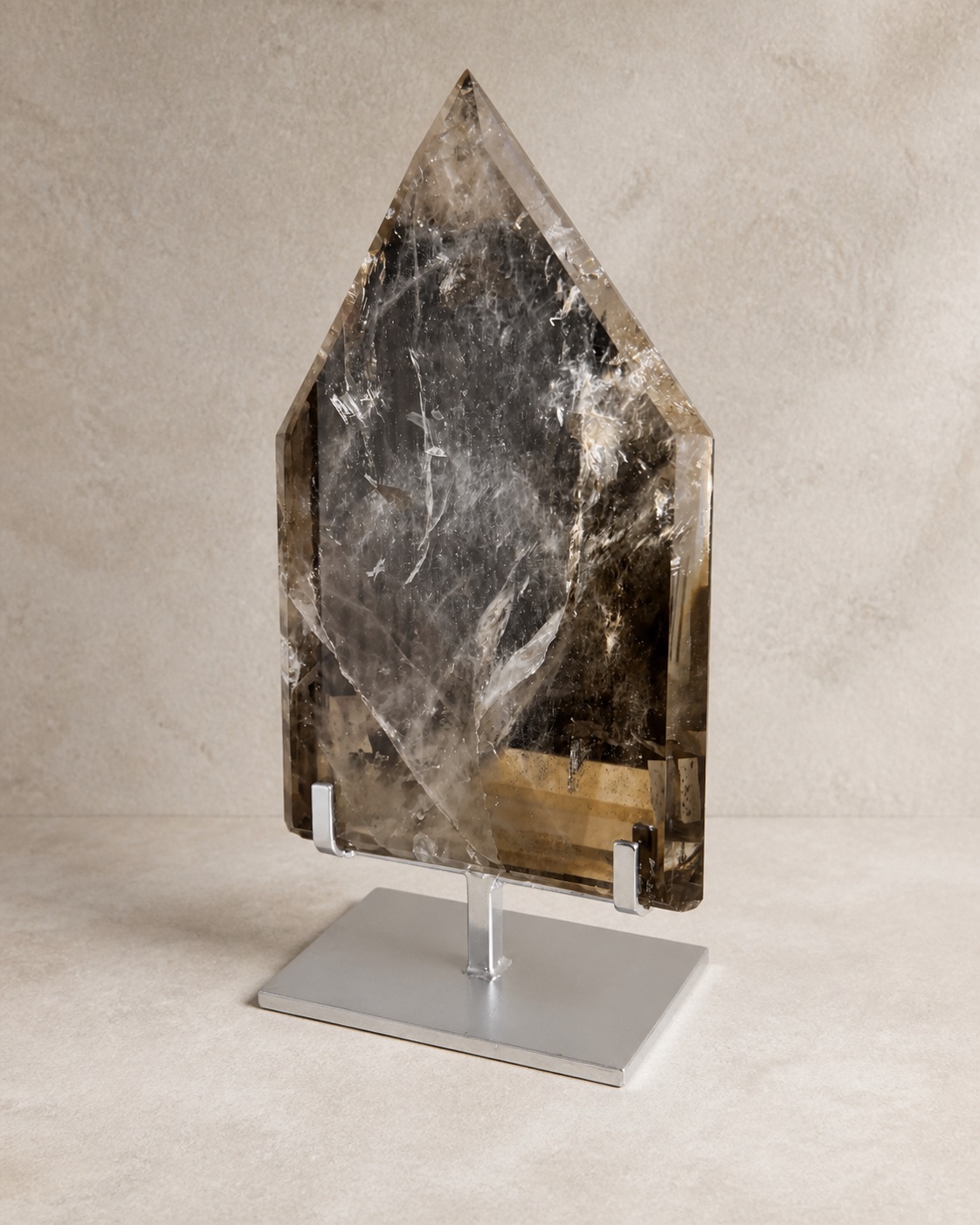 Alternate angle showing the shoulders and depth of the smoky quartz shield
